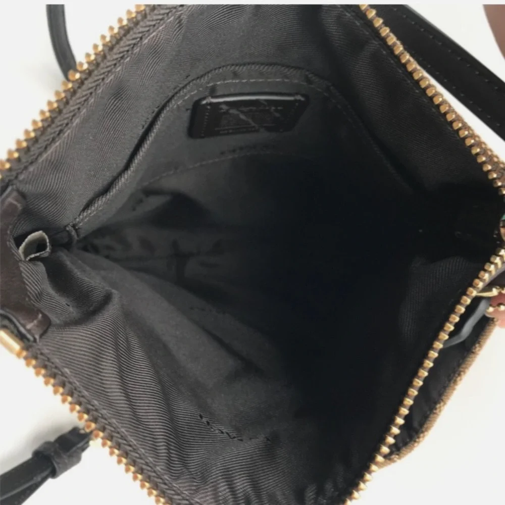 NEW Coach Bag Signature Canvas North South Swing pack 52576‎